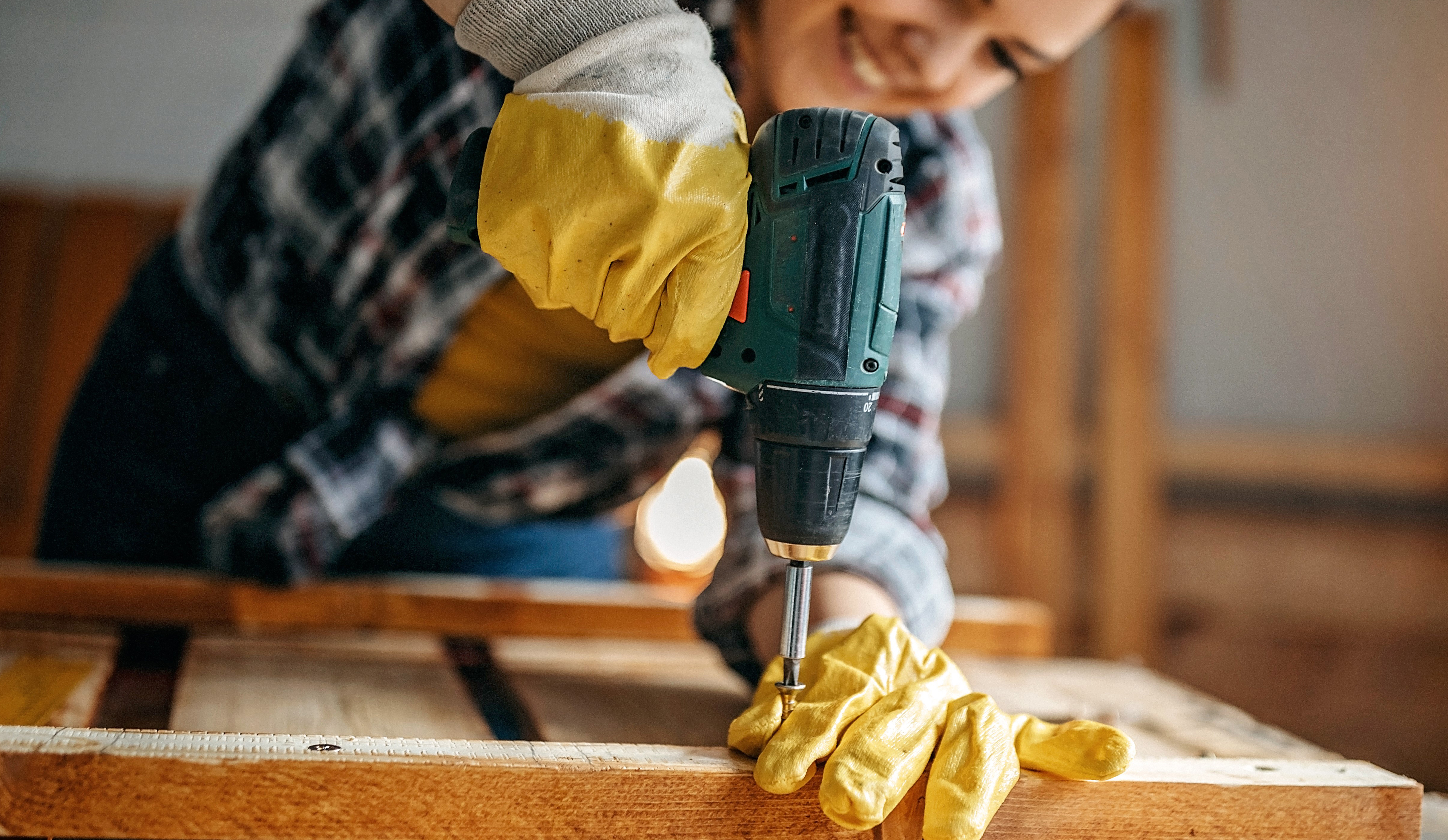 Woman using a drill