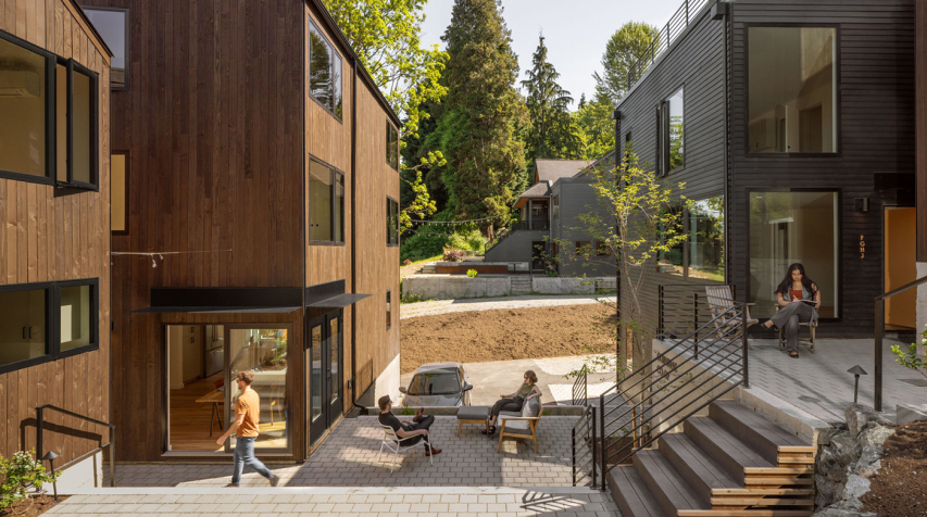 Modern residences surrounding a shared courtyard.