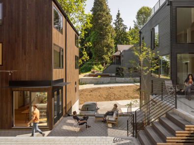 Modern residences surrounding a shared courtyard.