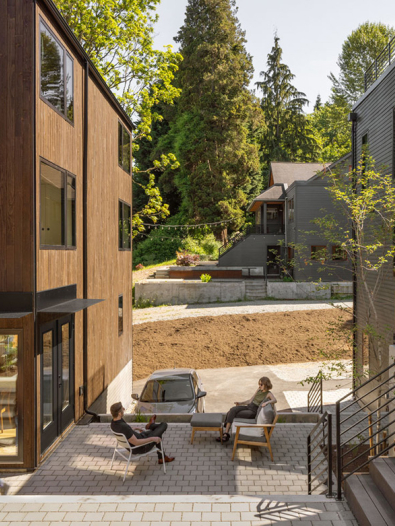 Modern residences surrounding a shared courtyard.