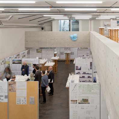 A jury evaluating proposals for a new public-school complex in a competition organized by the City of Zurich.