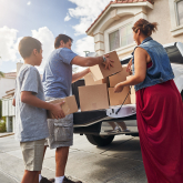 Hispanic family moving into a new home.