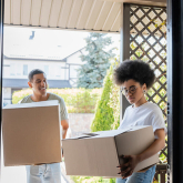 Couple moving boxes.