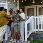 Black family on their porch.