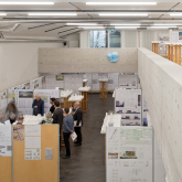 A jury evaluating proposals for a new public-school complex in a competition organized by the City of Zurich.