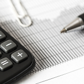 Calculator and pen.