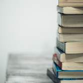 Stack of textbooks.
