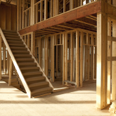 Wall framing in home under construction.