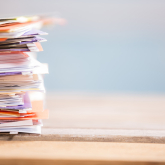 Stack of paperwork.