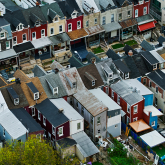 Aerial view of older rowhomes. 