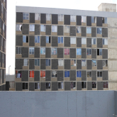 Concrete apartment building.