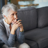 Older adult woman in her home.