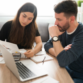 Couple reviewing their finances.