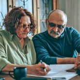 Couple reviewing their finances.