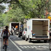 Moving truck on a street.