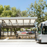 Bus approaching Woodley stop in Los Angeles.