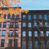 Apartment buildings on a city block.