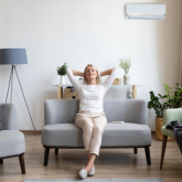 Woman sitting in living room