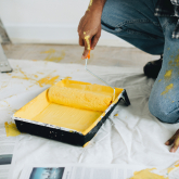 Man using a paint roller