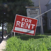 For-rent sign in front yard.