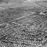 Aerial view of suburban single-family homes in the 1940s.