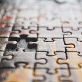 Puzzle with missing piece.