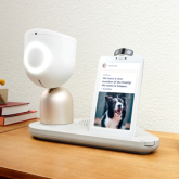 View of EllieQ robot sitting on table.