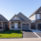 Small single-family houses on a residential street.