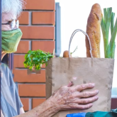 Woman receiving groceries