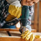 Woman using a drill