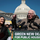 Bernie Sanders speaking at a political rally