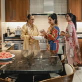 Family making food together in the kitchen