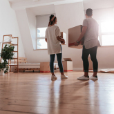 Couple moving into new home.