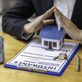 Person with insurance paperwork.