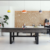 Two people playing ping pong.