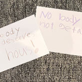 Notes in child's handwriting:" Everybody deserves a house" and "Nobody should not have a house!"