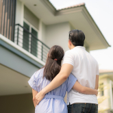 Couple looking at a home for sale.