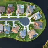Aerial view of suburban homes lining a cul de sac.