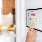 Home tech panel on the wall.