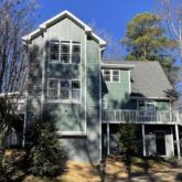 A home with a two-story addition.