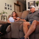 Older adult couple in their living room.