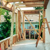 House-under-construction-frame-ladders.jpg
