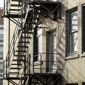 View of an apartment building fire escape.