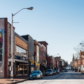 View of a street in a small downtown area.