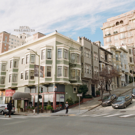 Small multifamily building in a busy neighborhood.