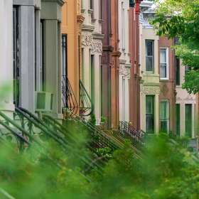 Block of townhouses with staircases.