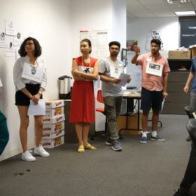 Group of organizers doing exercise.