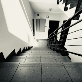 B&W photo of an interior staircase