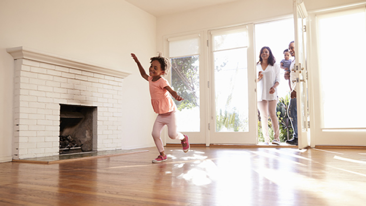 Family entering new home