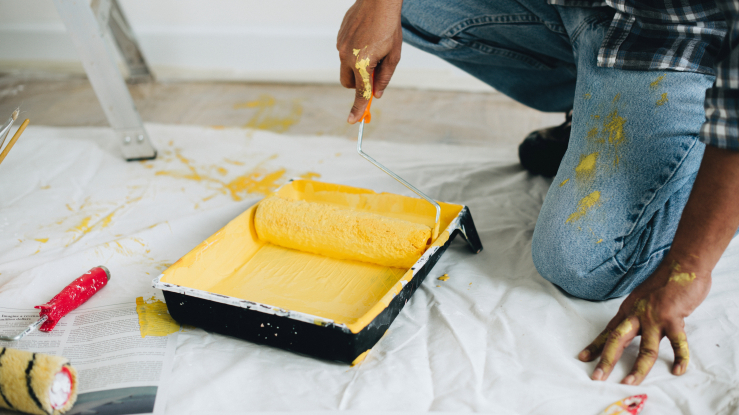 Man using a paint roller